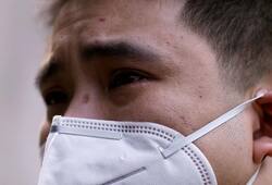 China again reports coronavirus, nearly 100 cases in single day