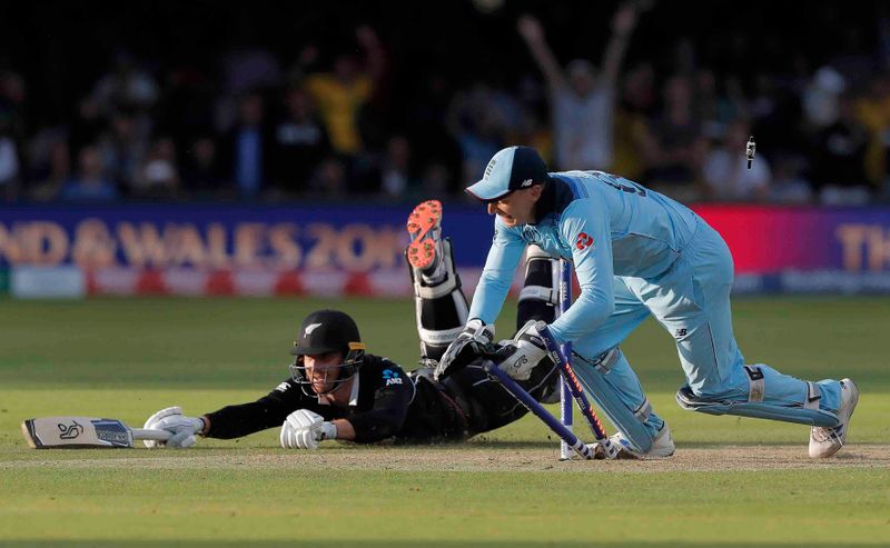 Runner-Up: Tom Jenkins (The Guardian). England's Jos Buttler runs out Martin Guptill to tie the Super Over in the final of the ICC World Cup 2019 at Lord's, on July 14, 2019. England won the World Cup on boundary count. Photo courtesy: MCC.