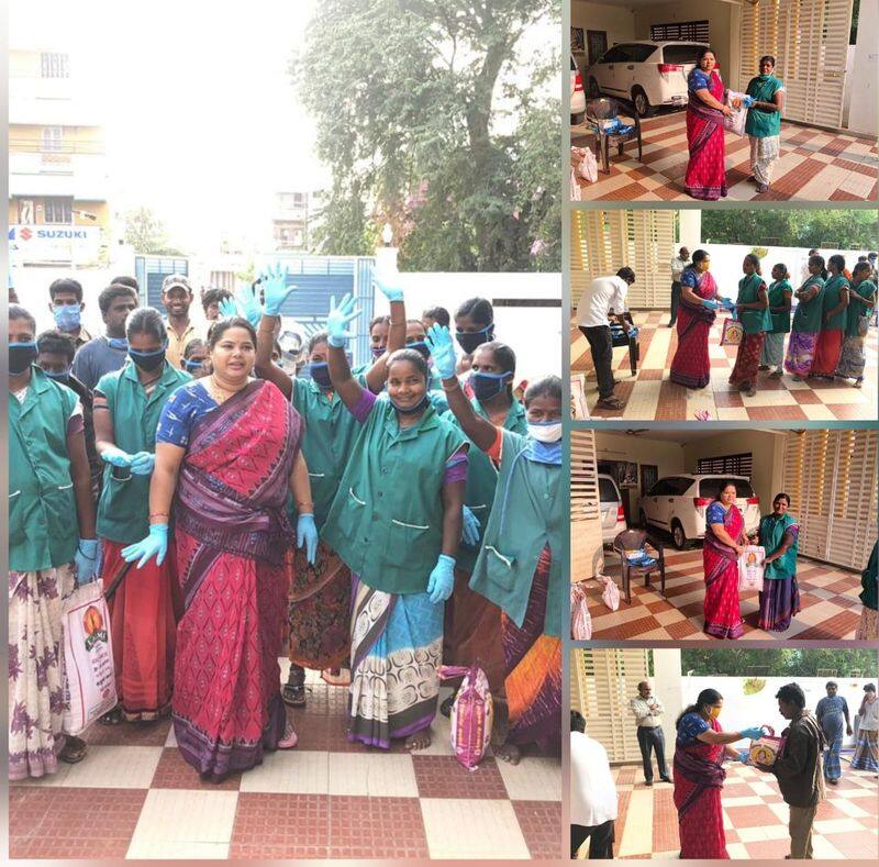 dmk women cadre gives grocery products to people involving in corona prevention activities