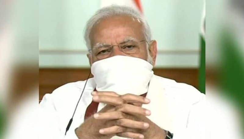 India under lockdown: PM Modi wears homemade face mask as he meets CMs