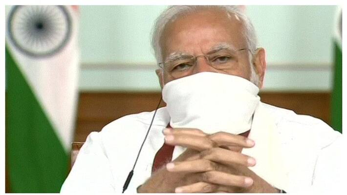 pm modi wear home made mask in video conference with chief ministers pm modi wear home made mask in video conference with chief ministers