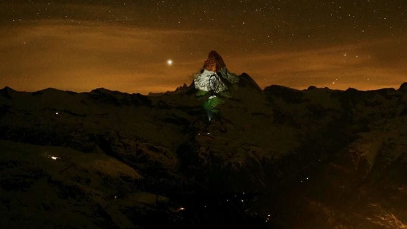 Coronavirus Indian tricolour projected on Switzerland Matterhorn mountain