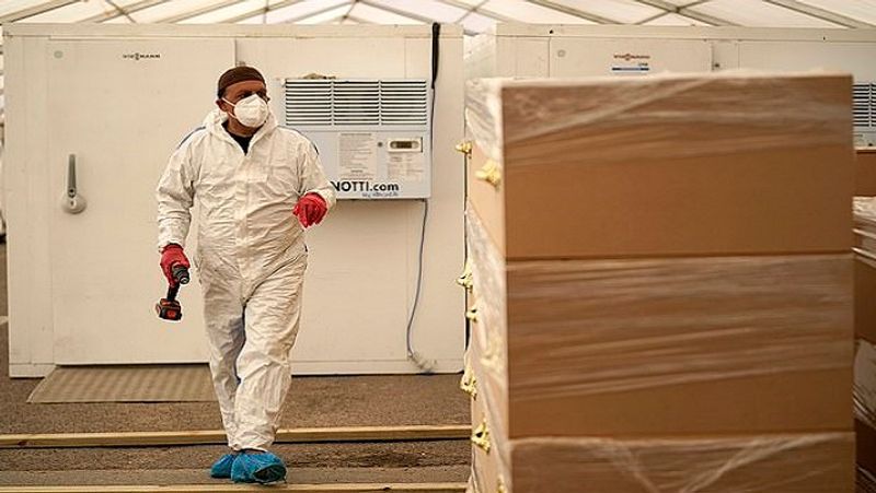 Specially trained volunteers at the religious establishment have been assisting in the mosque's efforts to deal with the increasing death toll.