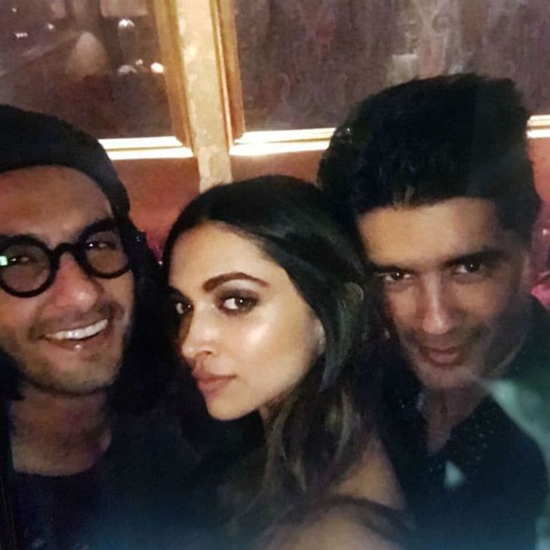 The actress appears in a picture with Ranbir Kapoor's cousins Aadar Jain and Armaan Jain. There is nothing wrong with the images, it's just that Deepika is swamped by the two guys, looking droopy-eyed, and in one picture being shown some love by Aadar Jain. So, what?
