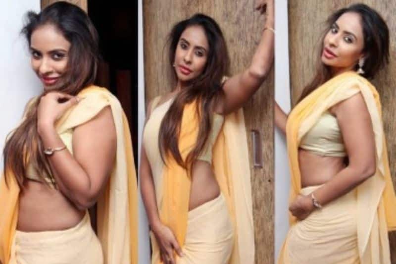 Actress Sri reddy Posting Glamour Photo With liquor Glass