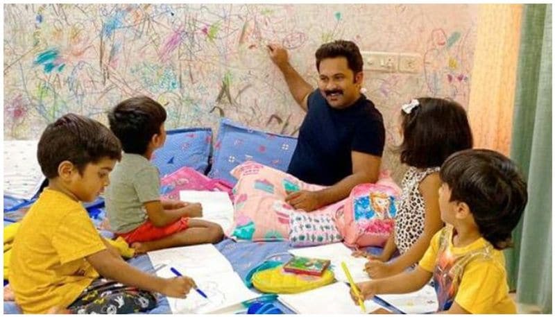 Malayalam actor Aju Varghese has shared a picture of him with his four children