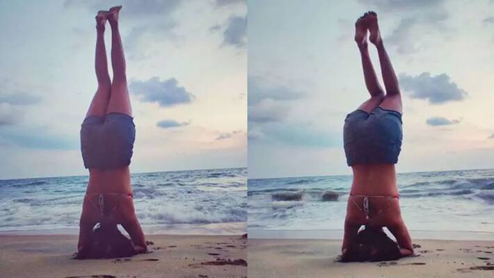 amala paul shares sheershasana pictures amala paul shares sheershasana pictures