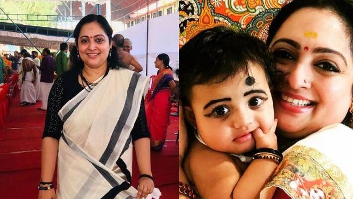 actress reshmi soman shared a photo with cousins baby actress reshmi soman shared a photo with cousins baby