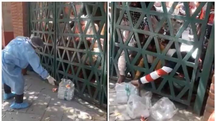 video from up throwing food at people who have been quarantine video from up throwing food at people who have been quarantine