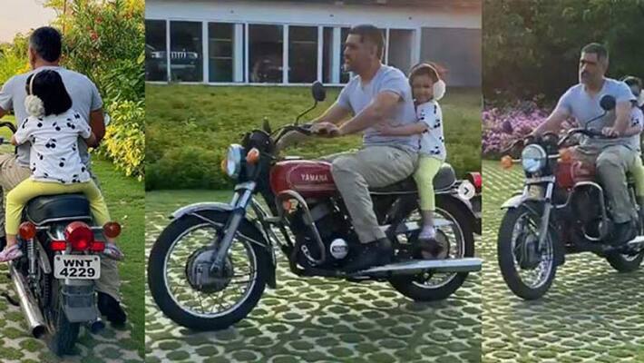 dhoni and her daughter ziva bike rounds in home video goes viral in social medias dhoni and her daughter ziva bike rounds in home video goes viral in social medias