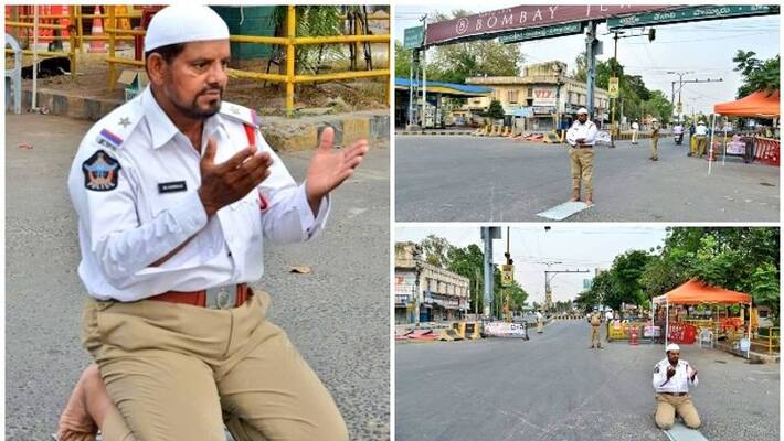 police inspector offered Ramzan prayers on the road while he was on duty in Andhra Pradesh police inspector offered Ramzan prayers on the road while he was on duty in Andhra Pradesh