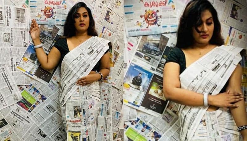 saree made with news paper by merin mathews