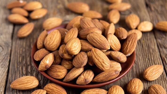Snacking on almonds will also help in weight loss says the study Snacking on almonds will also help in weight loss says the study