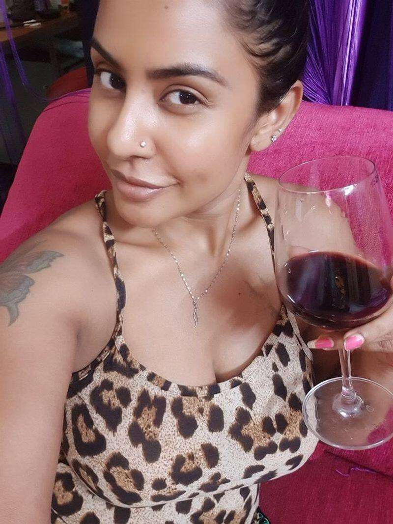 Actress Sri reddy Posting Glamour Photo With liquor Glass