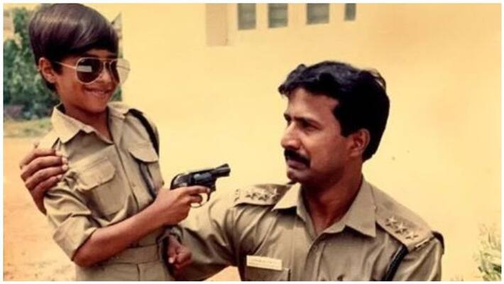 actor vishnu vishal play with father in police getup photo goes viral actor vishnu vishal play with father in police getup photo goes viral