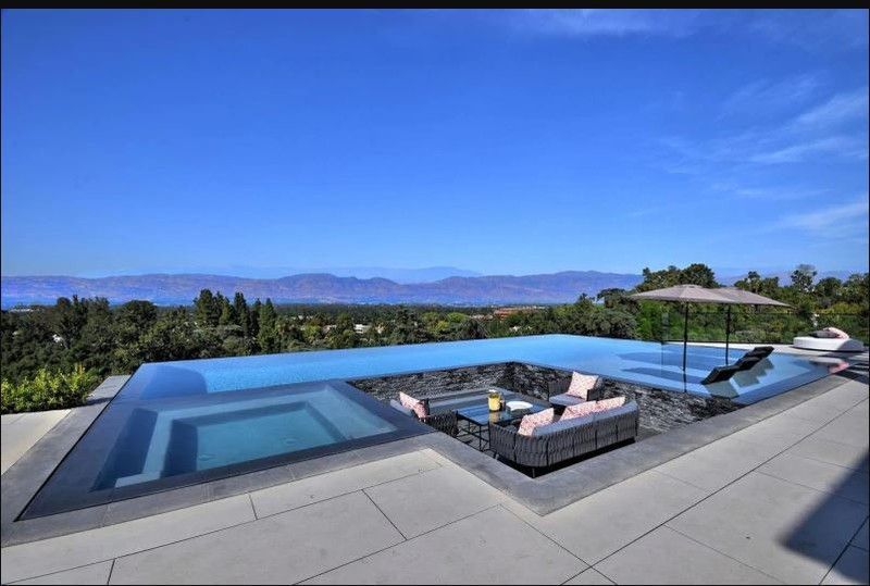 The house also has a gymnasium, movie theatre, wet bar, game room, indoor basketball court, a bowling alley, infinity pool, a lawn and additional seating arrangements.
