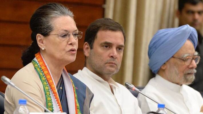 Congress leaders clash in Sonia gandhi presence Congress leaders clash in Sonia gandhi presence