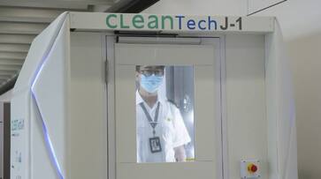 Coronavirus Hong Kong airport trials full-body disinfection booth deploys cleaning robots fight COVID-19 Coronavirus Hong Kong airport trials full-body disinfection booth deploys cleaning robots fight COVID-19