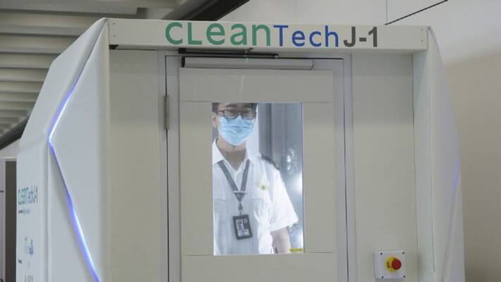 Coronavirus Hong Kong airport trials full-body disinfection booth deploys cleaning robots fight COVID-19 Coronavirus Hong Kong airport trials full-body disinfection booth deploys cleaning robots fight COVID-19
