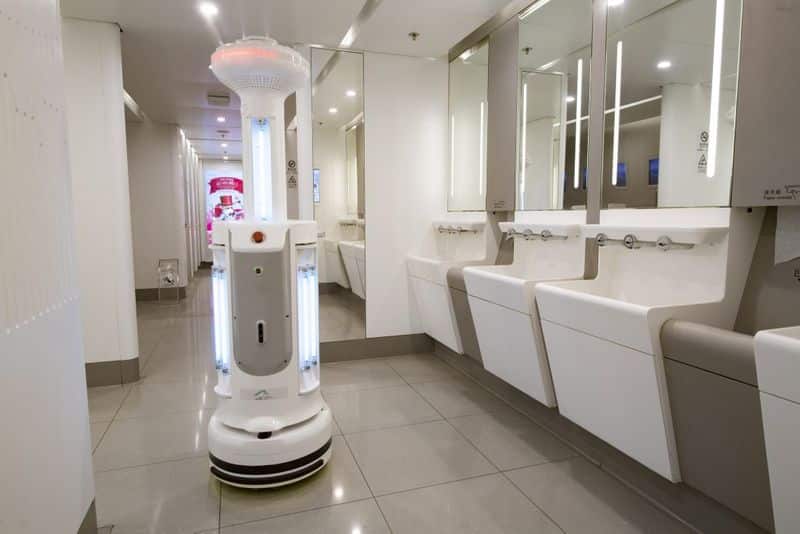 Coronavirus Hong Kong airport trials full-body disinfection booth deploys cleaning robots fight COVID-19