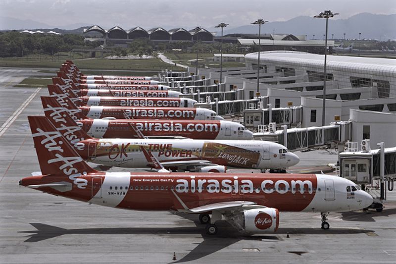 AirAsia aircraft can be seen parked at the tarmac of Kuala Lumpur International Airport 2 (KLIA2)