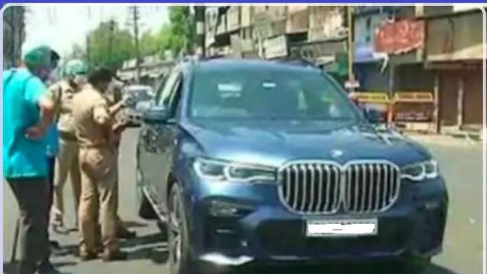 Police fined Man who drive his bmw x7 car from noida to meerut to buy vegetable Police fined Man who drive his bmw x7 car from noida to meerut to buy vegetable
