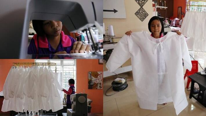 nine year old malaysian school girl sws ppe gown for health workers nine year old malaysian school girl sws ppe gown for health workers