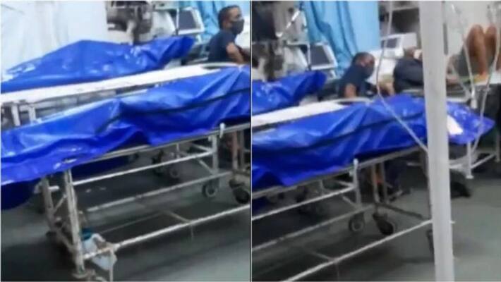 video shows bodies wrapped in plastic lying next to patients video shows bodies wrapped in plastic lying next to patients
