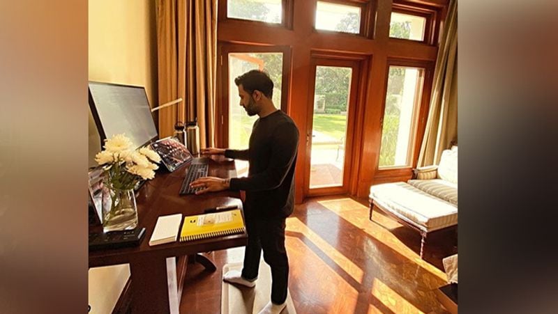 Check out the couple's study room. Anand Ahuja is seen working on his desktop. 