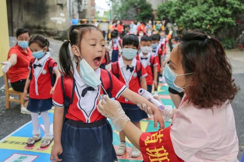 Coronavirus Beijing schools closed again, over 1,200 flights cancelled amid fear over new virus outbreak