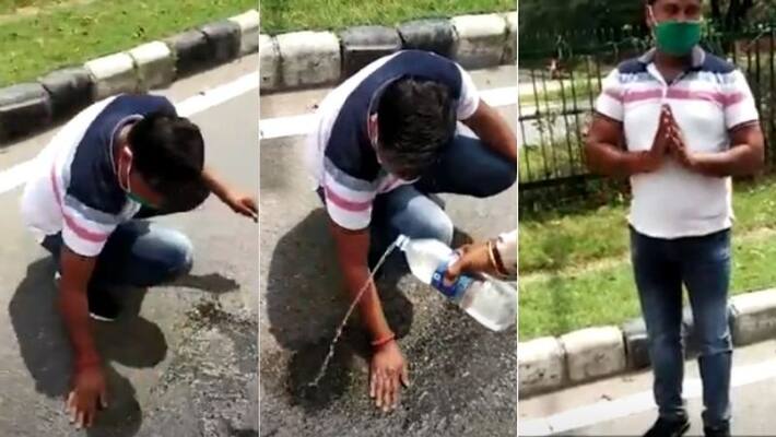 chandigarh biker spat on road after wipe the spot chandigarh biker spat on road after wipe the spot