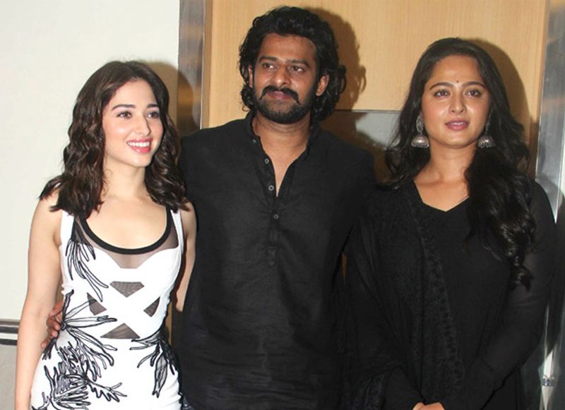 However, it looks like Tamannaah was not happy being a messenger and leaned back, only to give Prabhas the right view to directly convey the message to Anushka. Later, Anushka only smiled and reacted calmly.
