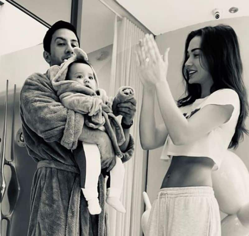 Amy Jackson gets trolled for wearing side chest revealing dress in front of her son ADB