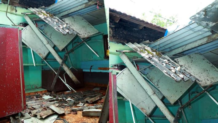 house damaged in heavy winds and rain house damaged in heavy winds and rain