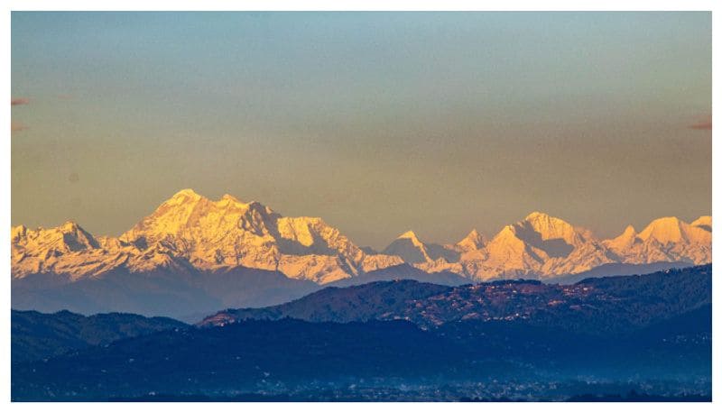 An incredible photo shows Mount Everest visible for the first time in decades from the Nepalese city of Kathmandu.