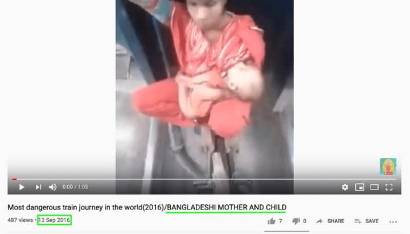 Video of mother sitting between train carriages with infant