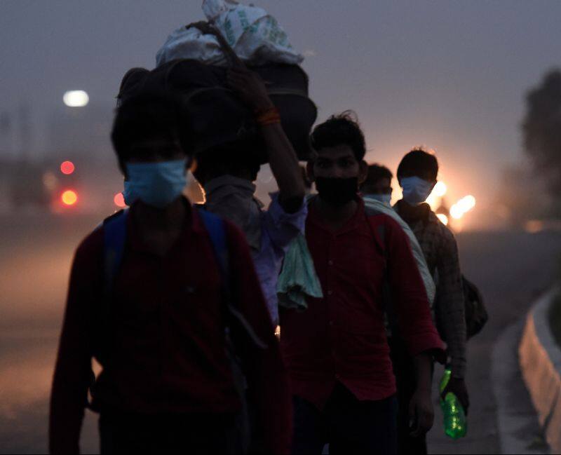 PTI photographer Atul Yadavs iconic image of migrant plight by Rajeev Somasekharan