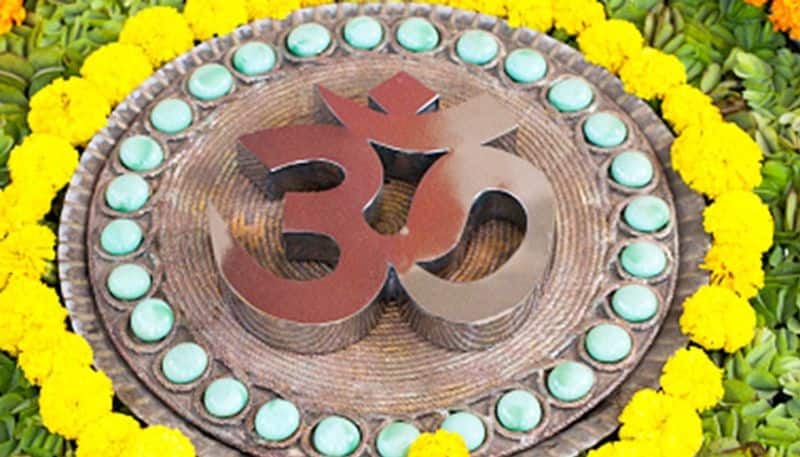 Om - Realization of the supreme cosmic principle of Brahman in Hinduism