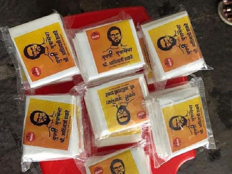 Shiv Sena distributes photos of Aditya Thackeray to women with sanitary napkins