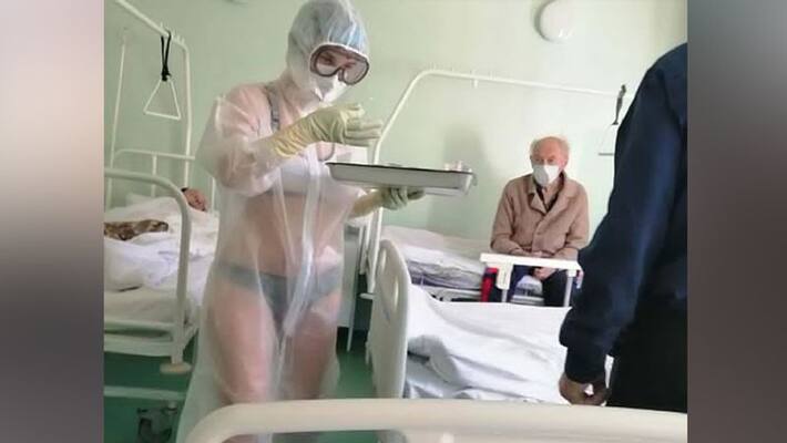 Russian half nude nurse dismissed by hospital admin Russian half nude nurse dismissed by hospital admin