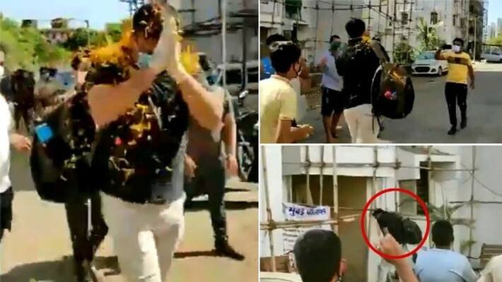 mumbai police receives grand welcome as he reach home after covid recovering mumbai police receives grand welcome as he reach home after covid recovering