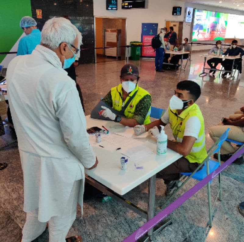 A passenger who landed at the Bengaluru airport is being checked by the government health officials