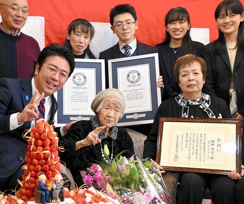 Tanaka poses for photographs during a ceremony as she is recognised as the world oldest living person on March 9, 2019 in Fukuoka, Japan.