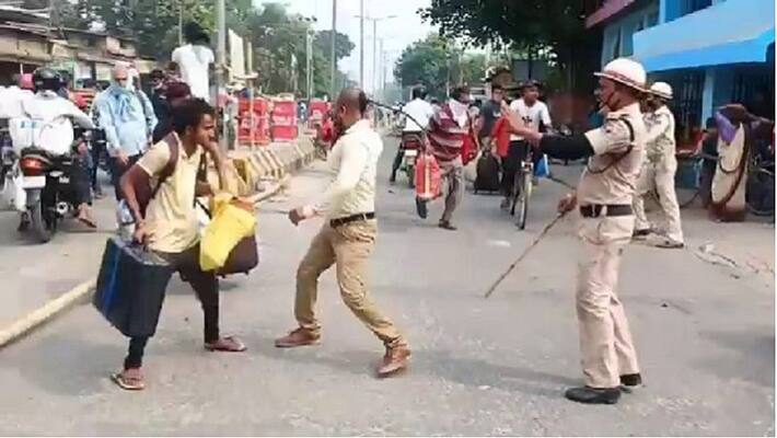 The police lathi-charged the migrant laborers coming from Kerala asa The police lathi-charged the migrant laborers coming from Kerala asa