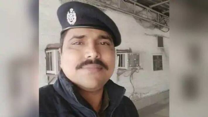 railway cop run Towards Moving Train To Provide Milk For Infant railway cop run Towards Moving Train To Provide Milk For Infant