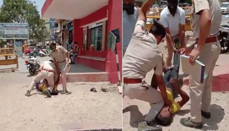 Police does a near repeat of George Floyd case Pins man down with knee on neck Vishnu Vasisht