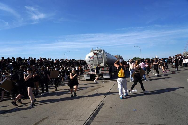 man shot at protest by a car driver