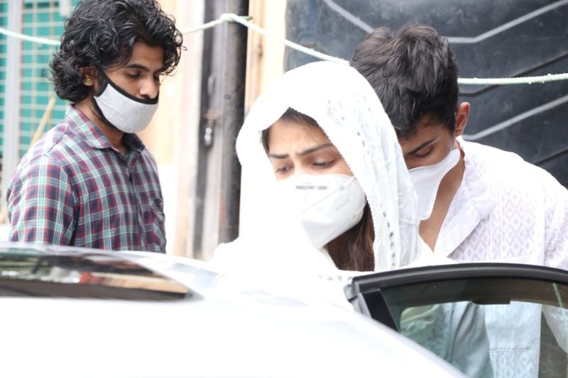 Rhea was seen wearing a white salwar kameez
