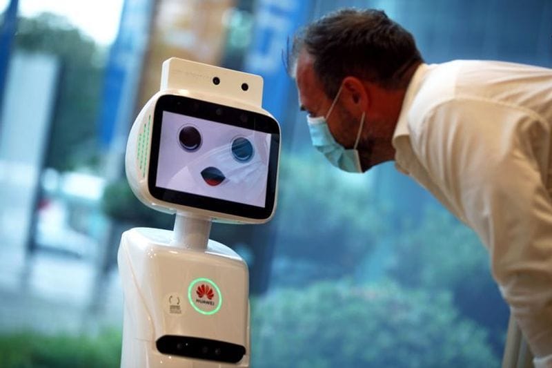 Robot Zafira scans customers for masks, dispenses sanitiser at Tamil Nadu garment store BSS