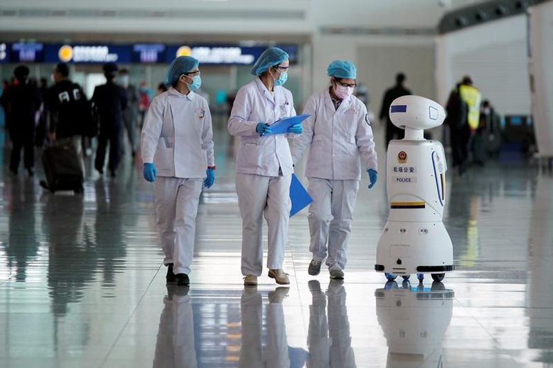 robots replacing humans in corona days